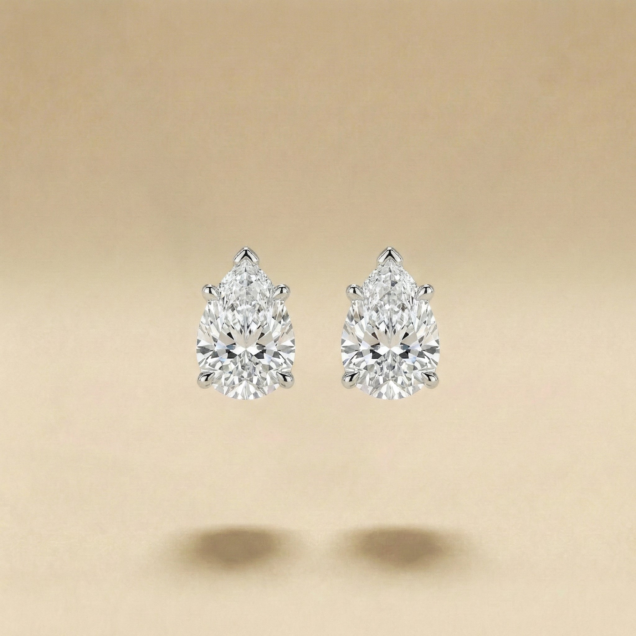 Pear Solitaire Diamond Stud Earrings